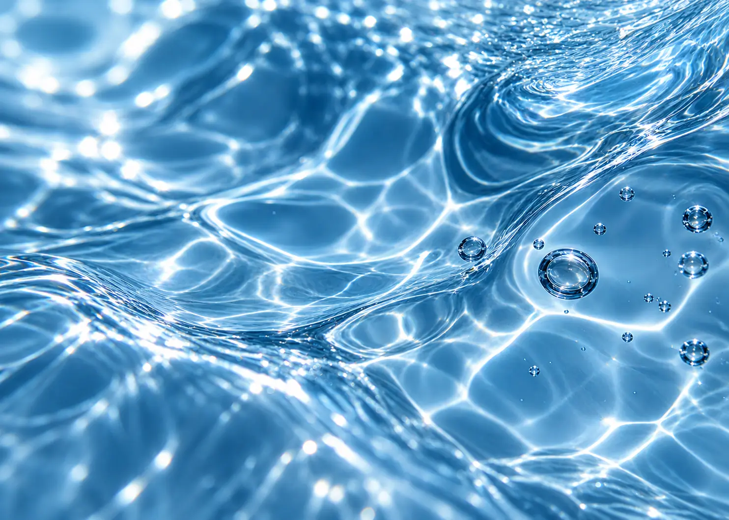 Blue water texture with reflective bubbles